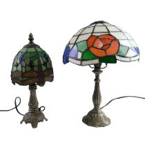 Two late 20th Century table lamps having leaded glass shades, the smaller decorated with Tiffany