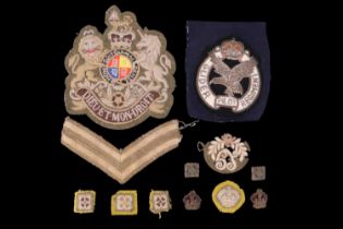 A small group of British army cloth insignia including a post-1952 RQMS rank badge and a Glider