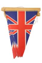 A quantity of printed paper Union Jack bunting, circa 1940s, individual pennant 38 cm long