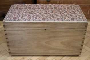 A mid-to-late 20th century walnut ottoman bedding box, having a lift-out inner tray, 92 x 46 x 55