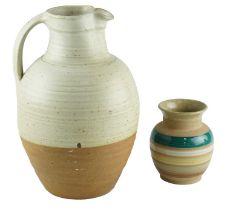 A large semi-glazed stoneware studio pottery jug together with a Jersey Pottery vase, former 36 cm