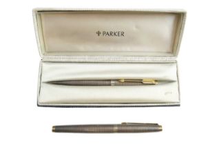 A white metal Parker 75 'Cisele' propelling pencil and fountain pen set, each having chequerboard