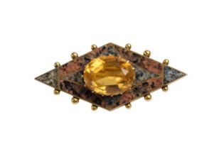 An Edwardian citrine and hardstone brooch, comprising a lozenge-shaped 9 ct gold brooch surrounded