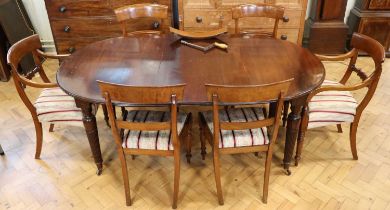 A Victorian mahogany dining suite, comprising an extending dining table with one additional leaf,