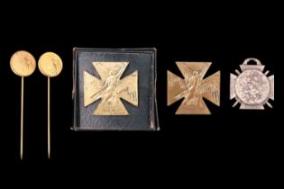 Two Great War Lalique gilt metal pin badges together with three French commemorative medallions