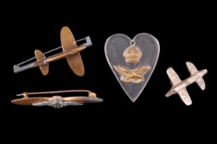 A Second World War RAF sweetheart brooch, a workshop-made Lucite and brass sweetheart pendant and