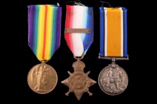 A 1914 Star with clasp, British War and Victory Medals to 44919 Gnr / Bmbr G Johnston, Royal Field