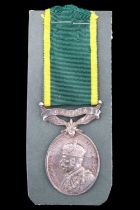 A George V Canadian Efficiency medal to A Band-Sgt L Galloway, Middlesex and Huron Regiment