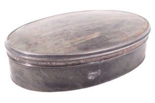 A George II white metal mounted tortoiseshell table box, of oval section with subtly domed slip-