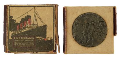 A Lusitania medal in carton