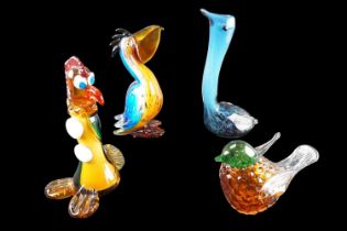 Four studio glass birds, tallest 30 cm