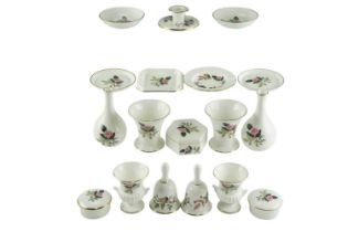 A quantity of Wedgwood Hathaway Rose vases, lidded boxes, dishes, etc