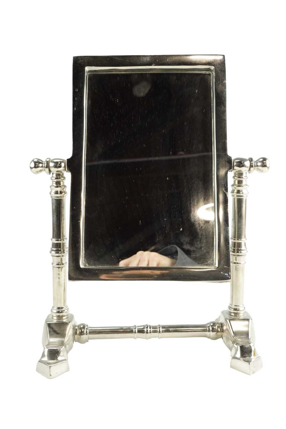 A late 20th Century chrome-plated aluminium swivel mirror, 27 x 34 cm