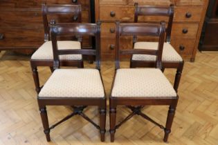 A set of four Regency mahogany dining chairs, having x-frame stretchers, 83 cm