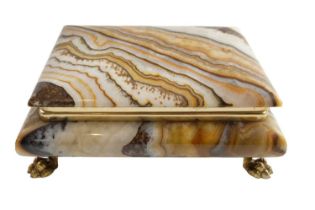 A banded onyx table box, 15.5 cm x 12 cm x 17 cm