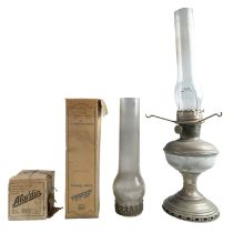 An Aladdin Model II oil lamp together with a boxed Aladdin blue flame heater, a 12 1/2" Lamp