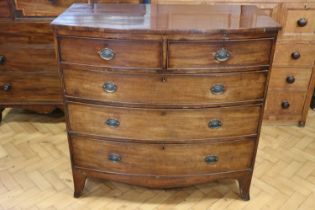 A George III bow-fronted mahogany chest of two short over three long drawers, 105 x 55 x 105 cm