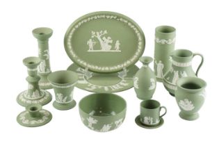 A quantity of Wedgwood Green Jasperware, including candlesticks, a jug, plates, etc