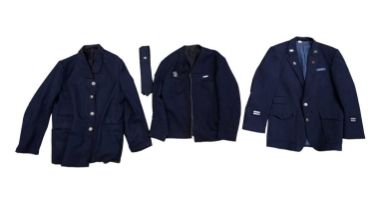 Three British Railway uniforms together with an associated train departures booklet