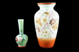 Two Victorian enamelled glass vases, tallest 25 cm