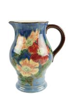 A late 20th Century Royal Doulton floral decorated jug in the Wild Rose pattern, the base marked
