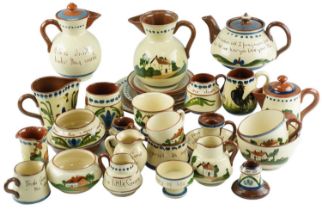 A collection of Torquay Ware, including Longpark, Watcombe, Devon Motto Ware, etc, tallest 14.5 cm