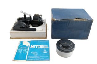 A Mitchell fishing reel in original box