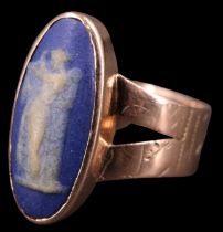A late Victorian jasperware cameo ring, the 17 x 7 mm blue cameo depicting a standing classical
