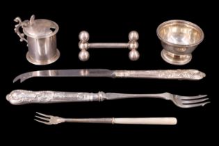 A Victorian silver salt cellar, Birmingham, 1869, together with a silver-handled pickle fork and