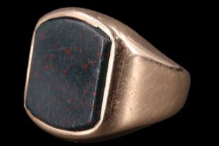 A bloodstone signet ring, having a 12 x 11 mm vacant matrix set in a 9 ct gold shank, internally