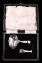 A cased 1950s silver infant feeding spoon and pusher, Harrison Brothers & Howson (George Howson),