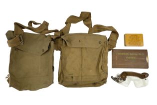 A group of Second World War British army anti-gas kit comprising two respirator haversacks, anti-gas
