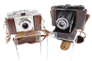 Two cased Agfa cameras comprising a 1940s folding Isolette120 roll film and a 1950s 35 mm Silette