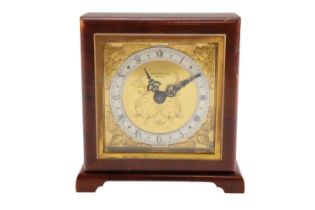 A 1940s Elliott walnut mantle clock, retailed by Johnston and Court, Carlisle, having a key wound
