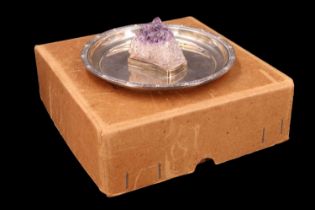 A boxed 1950s Lindisfarne shallow silver dish centred by a specimen of amethyst crystal, the everted