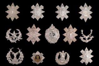 A small collection of Scottish cap badges