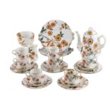 A Victorian transfer printed and hand enamelled Aesthetic Movement influenced teaset, the pot