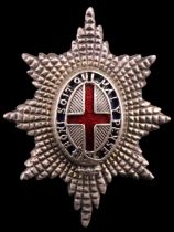 A Coldstream Guards officer's enamelled white metal cap badge, 35 mm, (tested as silver)