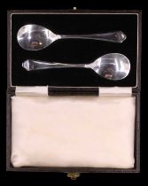 A cased pair of 1930s silver conserve spoons, Barker Brothers Silver Ltd, Birmingham, 1937, 30 g