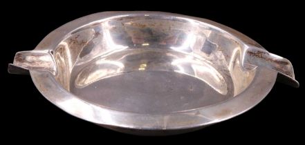 A 1940s silver ashtray, Joseph Gloster Ltd, Birmingham, 1944, 8 cm diameter excluding rests, 37 g