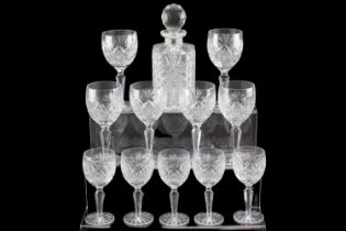 A set of Edinburgh crystal drinking glasses comprising six white and six red wine glasses, six