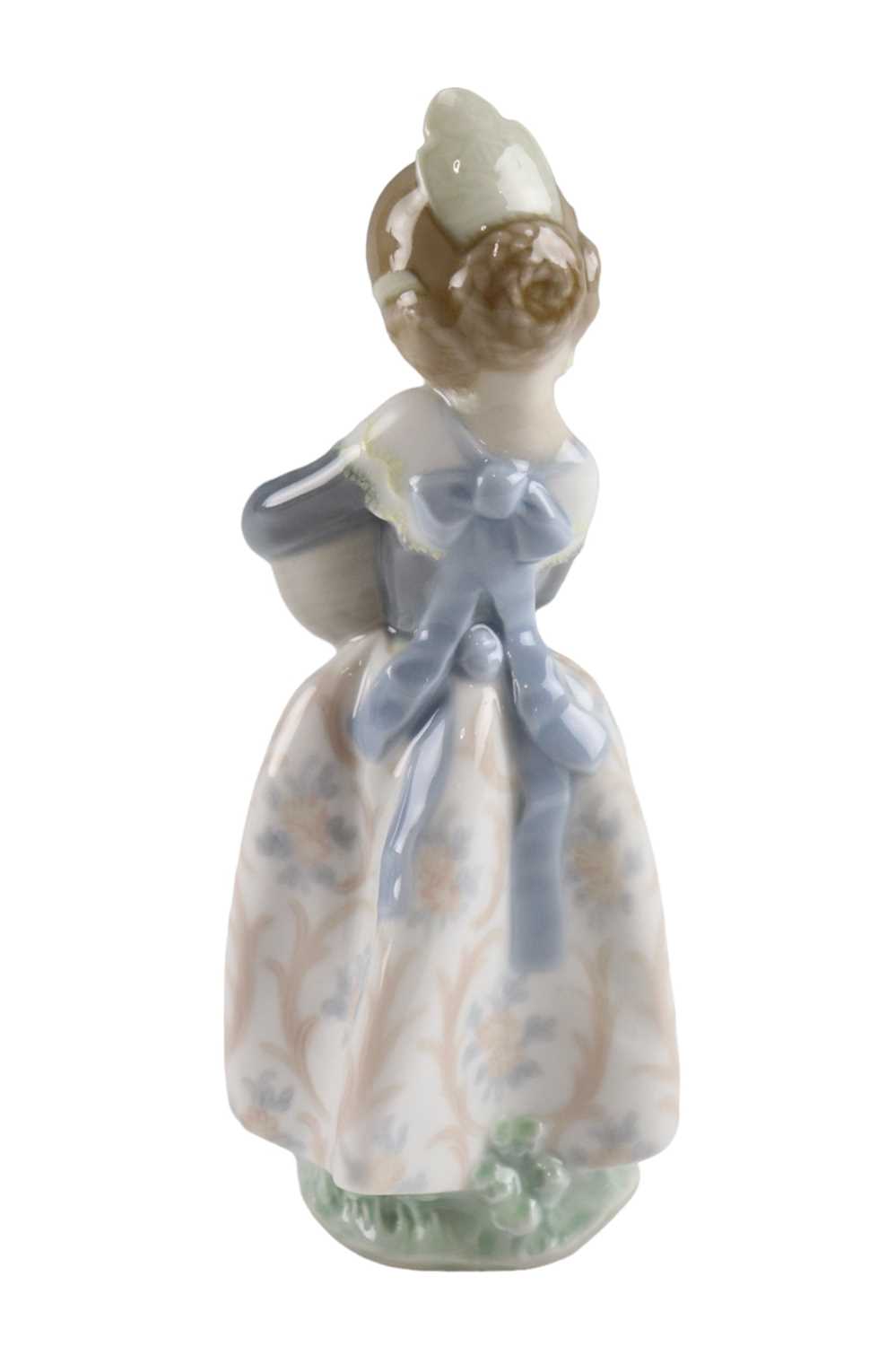 A Lladro figurine of a young girl holding a basket of fruit, height 17.5 cm - Image 2 of 3