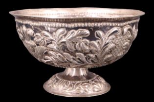A late 18th / early 19th Century Dutch white metal footed bowl, high relief decorated with