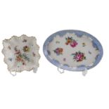 A late 19th Century Meissen oval tray decorated with hand-painted floral sprays within a cusped gilt