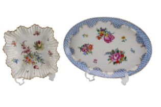 A late 19th Century Meissen oval tray decorated with hand-painted floral sprays within a cusped gilt