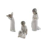 A Lladro figurine Early Morning together with two Zaphir figurines