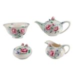 A Royal Doulton by Franz floral moulded three piece tea set with a covered box