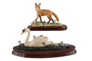 A Border Fine Arts swan family figure group signed KL together with another of a fox by Mairi