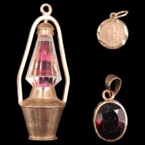 A 1970s 9 ct gold novelty pendant / charm in the form of a lantern, together with a bezel-set oval