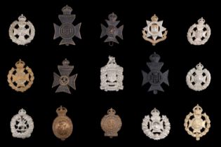 A collection of London Regiment and other cap badges